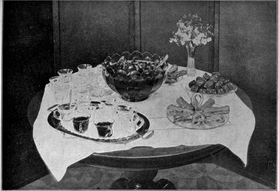 Photo by George H. Davis, Jr.  Courtesy of the Woman's Home Companion


THE PUNCH TABLE

This is a very pleasing form of refreshment during the summer months