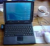 [Derek's PowerBook on the kitchen table]